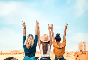 women having fun while traveling girls trip