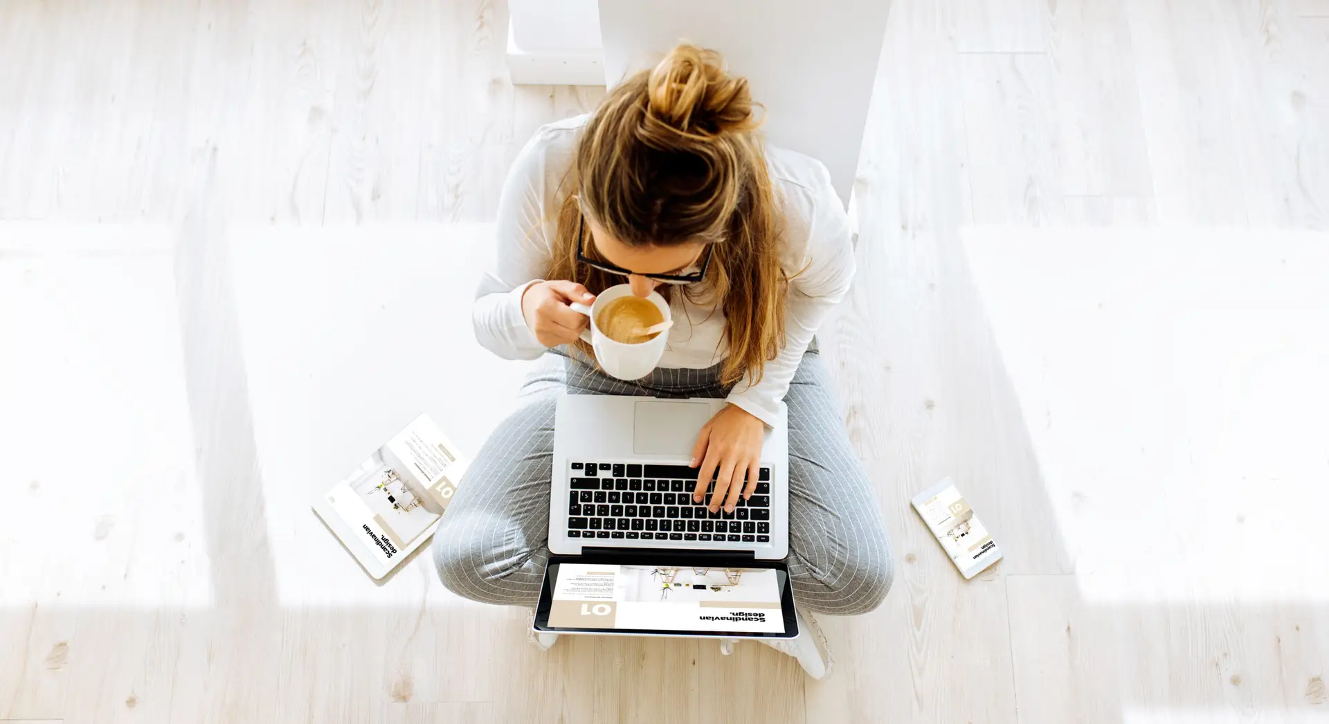 top view of woman working on responsive website