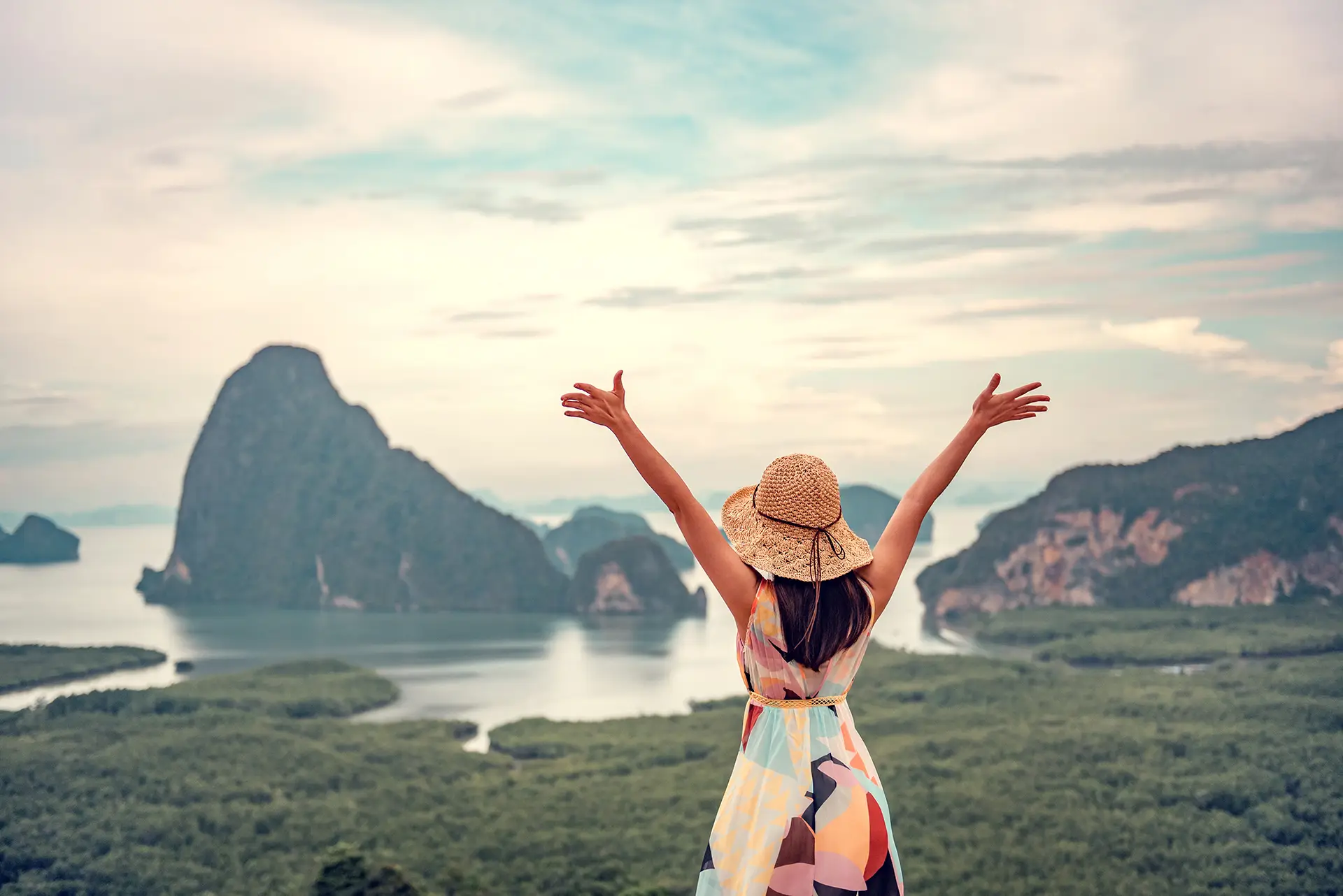 Freedom traveler woman relaxing with raised arms