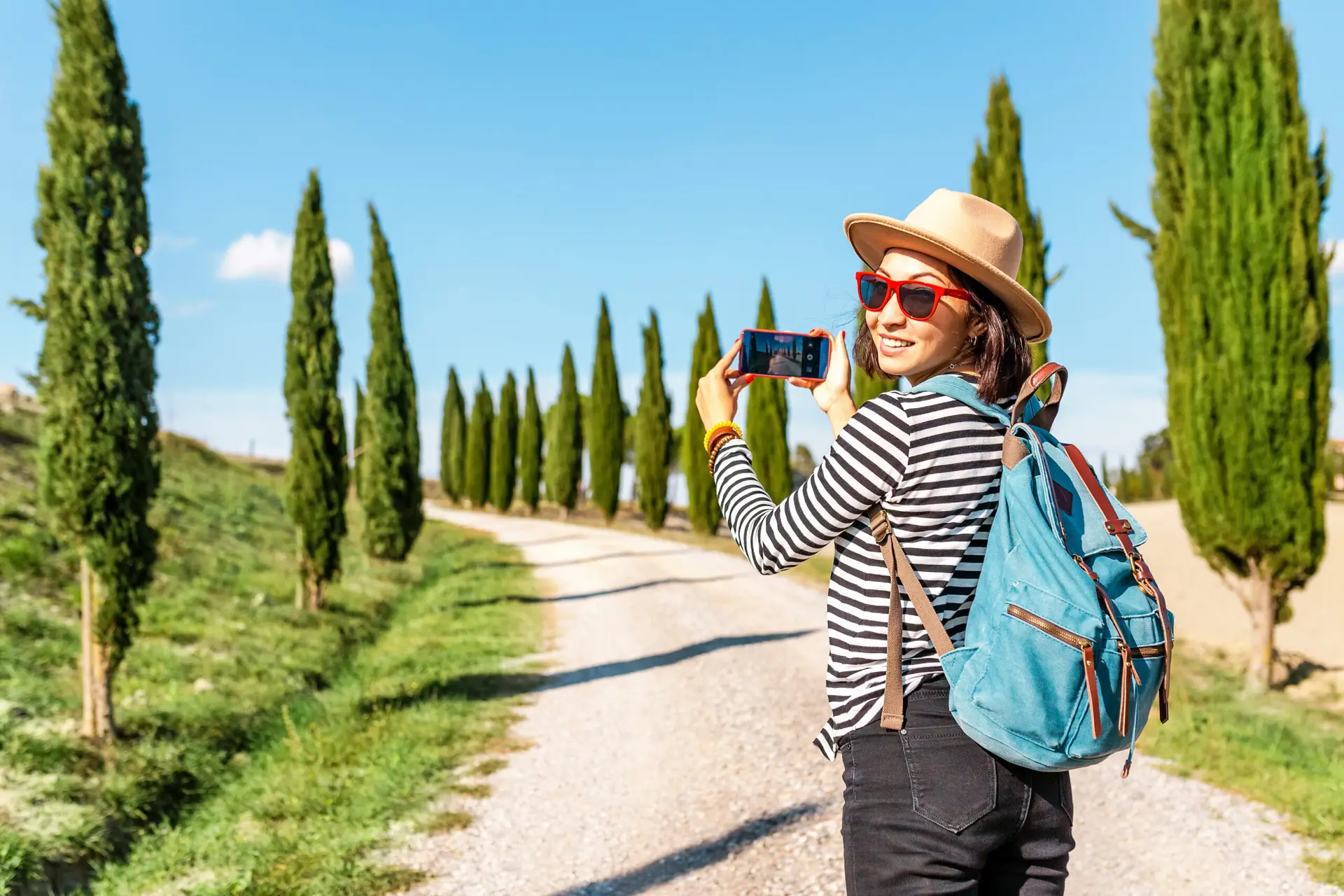 Vacation and travel in famous cypress alley, Tuscany and Italy tourist destination