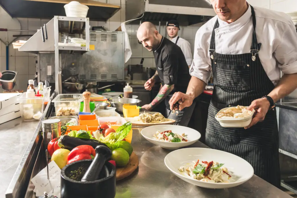 chef at amazing international restaurant for solo travelers