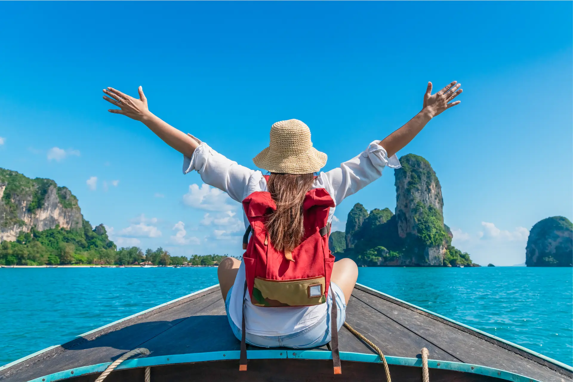 Happy traveler woman on boat joy fun nature view