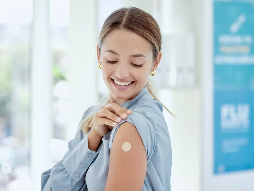 Women getting a vaccine